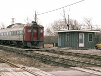 I found this image in the pile here in the den; not really all that great but interesting that it focused on the old Train Order Office by the CN Grimsby and Stamford Sub connection.  One of the at the time two daily Budd car runs from Toronto to NF has just passed me, and I must have taken this as an afterthought.
The "Station" is long gone.  Gloomy day. If the sun was out, I'd probably be facing it.