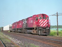 Three of those big beautiful CP 4700s pulling away from Guelph Jct eastward on an already pleasant morning. Power is CP 4709, 4738 and 4720.