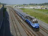 AMT 1343 leads EXO 1207 past Turcot Ouest. In the consist is AMT 3114, one of the few repainted EXO cars.