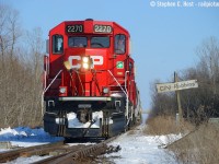 Enemy territory? I'm not going to claim to be an expert in Niagara options, so please do correct me, but I followed a <a href=http://www.railpictures.ca/?attachment_id=45572 target=_blank>GT Heritage unit (Jordan Station)</a> earlier in the day to Clifton and stuck around the Niagara Region on a cloudless, beautiful , not too cold winter's day. I ended up finding CP TE12? at CN Southern Yard trying to interchange cars in the yard, but they sat there for over an hour and I'd soon find out why - over the radio they couldn't get a switch to close properly and needed a CN MOW crew to come by and help them. After they gave up waiting, they decided not to attempt any further work (rather than try a switch on the south end) and they reversed all the way to CN Robbins to get back on home rails, which is rare because they apparently take the west leg of the wye normally between Robbins West and Brookfield East. While CP does occasionally wye here (they did last night) and of course, mainline CP freights go through here, locals are a rarity. Correct me if I'm wrong, but did CP/CN move the interchange to Southern Yard after NF was abandoned in 2001? Or was Southern Yard enabled for CP after the diamond at Netherby was removed?