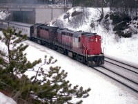 Throttling up for the long Copetown Hill grade  are CN Tempo engines 3153 and 3154, westbound toward London.