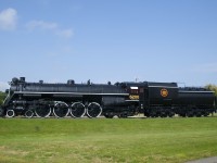 A broadside view of CN 6200 on a sunny morning. It has 73 inch drivers and a Vandberbilt tender. Underneath the cab window is '57%,' representing a tractive effort of nearly 57,000 pounds (56,785 to be exact).