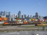 A quartet of zebra striped geeps (CN 4808, CN 4771, CN 4141 & CN 4707) is heading to the shop track to grab a caboose (shoving platform at this point) before taking grain cars to tracks PC-10 & PC-27.