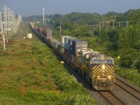 CN 108 has a pair of ex-Citirail units (CN 3915 & CN 3929) as it heads east into the sunrise just after passing CN 149. CN has acquired a number of Citirail units that had been numbered in the CREX 1300 and 1400-series; my understanding is they will be getting 75 of these units in total.