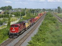 CP 143 has a nice lashup composed of CP 7055, UP 3830 & CP 8074 as it heads west. On the rear of the train is an entire CP 651 (empty ethanol train) and in fact the power and the ethanol cars would continue out of Toronto as CP 651 the next day.