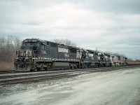 Over the recent years, the daily NS Buffalo to Fort Erie transfer has had a few surprises. An example was on this rather dull November day when I wandered down to check things out........probably on a day I had nothing better to do.
Power up front was NS 8759, 5525, 3034, BNSF 708 and CN (BCOL) 4649.  Made a nice change from the usual solid NS.  Photo is from the far west end of the yard,