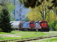 Sarnia's full of suprises and over the years you can get some things that you have great difficulty getting elsewhere - this was one of these days. With only 8 GTW GP9's on the roster today they were rare than and remain rare today, the CN GP9's not so much, but one of each together? This pair was together the entire weekend and I managed to shoot it on both days of my visit. Photographed as the IOX job works Cargill at the end of the Point Edward Spur.