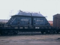 I am just putting this image out to the group in order that perhaps I could get some information on this car. I have not seen another one like it, and this image is 47 years old. Not sure of the location either, but I was out west at the time and I believe this was at Medicine Hat, as I shot other photos there. Can anyone identify this as to number of them, what was it originally, why styled in this manner and what became of them? I have nothing to go by, and my 1968 Equipment guide has tank cars numbered up to 389989; but no mention of a 389995.
The 1975 Guide shows this as one of 4 'tank cars' left in a series 389990-389995; but for water ??  THANKS