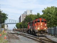 The Pointe St-Charles Switcher is exiting the Port of Montreal with CN 4141 & GTW 6226 for power after doubling its train together.