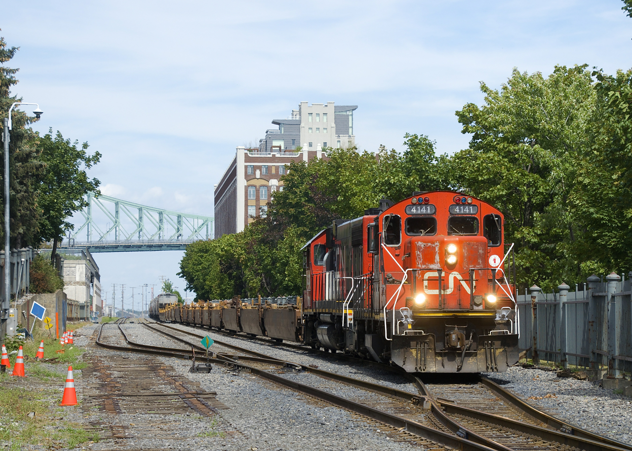 The Pointe St-Charles Switcher is exiting the Port of Montreal with CN 4141 & GTW 6226 for power after doubling its train together.