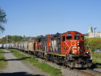 The Pointe St-Charles Switcher is heading back to its namesake yard with CN 4141, CN 4808 and grain cars picked up on the transfer track of CN"s Montreal Sub.