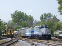 Most of Exporail's preserved AMT equipment is coupled together as CN 1382 prepares to lead an excursion train from Hays Station.