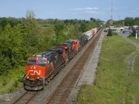 CN 377 has CN 2908, CN 3888, CN 5797 and 127 cars as it passes Cornwall Station. Further back in the train is one string of TankTrain cars, which will be set off at Brockville.