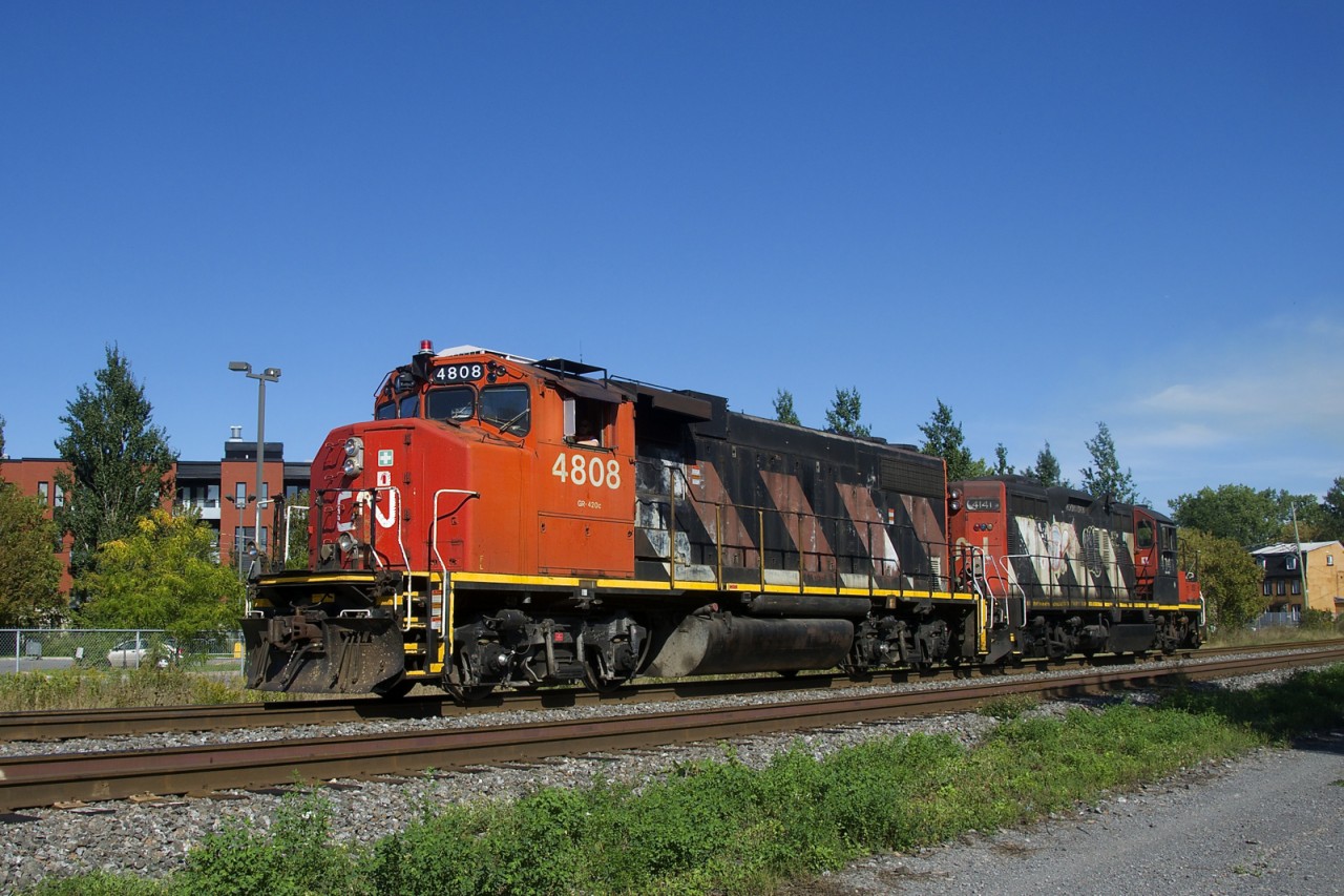 CN 596 with CN 4808 & CN 4141 is heading light power to Track 29 to pick up some cars for Pointe St-Charesl Yard.