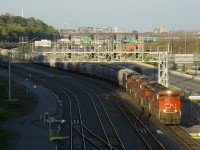 Sunlight is nearly gone from track level as CN 527 heads towards Taschereau Yard with 5 units (CN 8019, CN 8844, CN 5608, CN 2318 & CN 4782) as it passes Turcot Ouest.