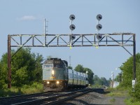 VIA 69 has five LRC cars and a single HEP car as it passes under a vintage signal bridge at MP 37.4 of CN's Kingston Sub.