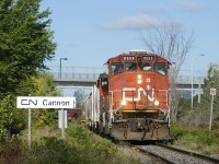 CN 522 has six cars for Saint-Jean-sur-Richelieu as it follows CN 324 down the Rouses Point Sub with CN 9555 & CN 4765 for power. It is passing CN Cannon; north of here is CTC territory, south of here is dark territory. It is named after Willam R. Cannon, the last superintendent of the Montreal & Southern Counties, an interurban that ran on these tracks for numerous decades. 