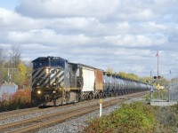 CN 305 has BCOL 4650 up front and CN 2671 mid-train as it heads west.