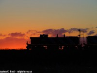 Riding into the sunset, a pair of GMD-1's growl as only a GMD-1 can, as the hogger has 'em in Notch 8 as they're on the mainline and the track speed is 60 MPH, dammit, and they're going to get back to Aldershot doing as much of that track speed as they can. In mere months the GMD-1 era will end as the units will be parked, and since then we've all feared the worst. CN has made the final move though, all of the parked GMD-1's are now for sale, and while some may have a future on other shortlines or industrial railways, hearing them on the CNR mainline echoing across the Niagara Escarpment in the Milton/Burlington area are now a distant memory.