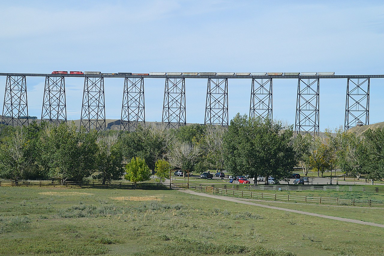 No one in the railfanning community on vacation goes by the Lethbridge Viaduct without checking it for trains. The landmark is almost a mile long and 300+ ft above the Oldman River.  So, we were not going to leave town without checking it either.  Waited an hour, but caught CP 6240 and 5049 heading west. What a sight!!