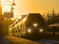 AMT 1354 leads a deadhead move through Montreal West Station at sunset.