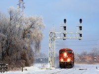 Loaded ethanol train CP 650 is approaching Lasalle Station a blustery winter day.