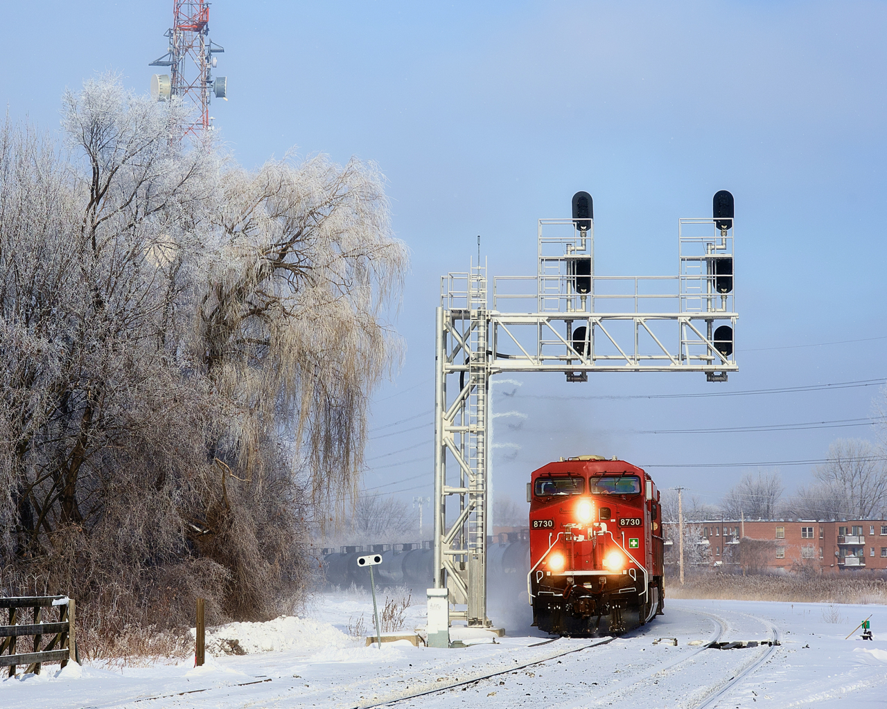 Loaded ethanol train CP 650 is approaching Lasalle Station a blustery winter day.