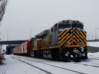 A pair of ex-CREX units (CN 3971 & CN 3934) are arranged elephant style on a loaded potash train that is parked near MP 4 of CN's Montreal Sub. On the tail end is a third ex-CREX unit (CN 3986). Both the leader and the tail end unit had been on lease to CN a few years back.