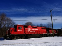 CP F95 with CP 4513 & CP 3100 is switching a Coca-Cola plant that is located just off of the Lachine Industrial Spur.