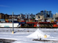 CN 4795 & CN 7054 are pulling into Pointe St-Charles Yard after arriving with grain empties from Canada Malting Company.