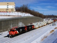 A late CN 149 is passing Turcot Ouest with CN 3909, CN 3151 and a 336-axle long train.