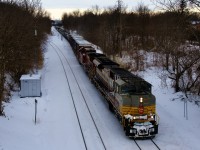 Heritage unit CP 7014 and CP 8023 lead a 69-car CP 251 past North Jct on a cold afternoon.