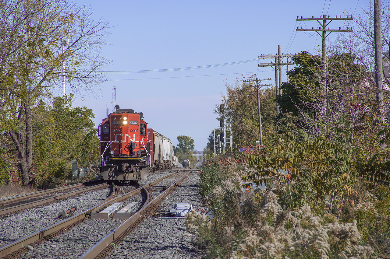 CN 540 has returned to Kitchener after working in Guelph and is seen shoving clear of the main into the yard.