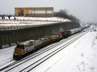 The snow is flying as CN 522 shoves cars into Track 29 at Turcot Ouest. Two ex-CREX units lead a regular CN unit (CN 3984, CN 3941 & CN 2984). CN 3984 had been on lease to CN as CREX 1514 a few years back.