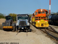 GEXR 583 is arriving in Guelph with construction equipment all around. With the death of the OBRY the Guelph Junction Railway is expanding due to increased business from the OBRY, and where the OBRY rails are being removed the GJR is adding them in return. A new track is being added at what is now called Kaufman's siding with another track planned - soon this will be a 4 track yard with the mainline right down the middle, I imagine it'll have to be called Kaufman's yard after completion. The name apparently harkens back to a company called Kaufman's Shoes (Kaufman's Rubber) but this company name only indicates a very large Kitchener factory presence, not one in Guelph based on a cursory search on the subject. More research is required.