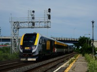 After testing at the National Research Council Canada facilities in Ottawa for over two months, part of VIA Rail's new Siemens Charger set is heading back towards the Montreal Maintenance Centre. It is blasting through Dorval with a Siemens Charger locomotive bringing up the rear.