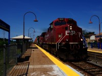 CP 118 flies through Cedar Park Station with CP 8121 & CP 8918 up front and CP 9375 mid-train.