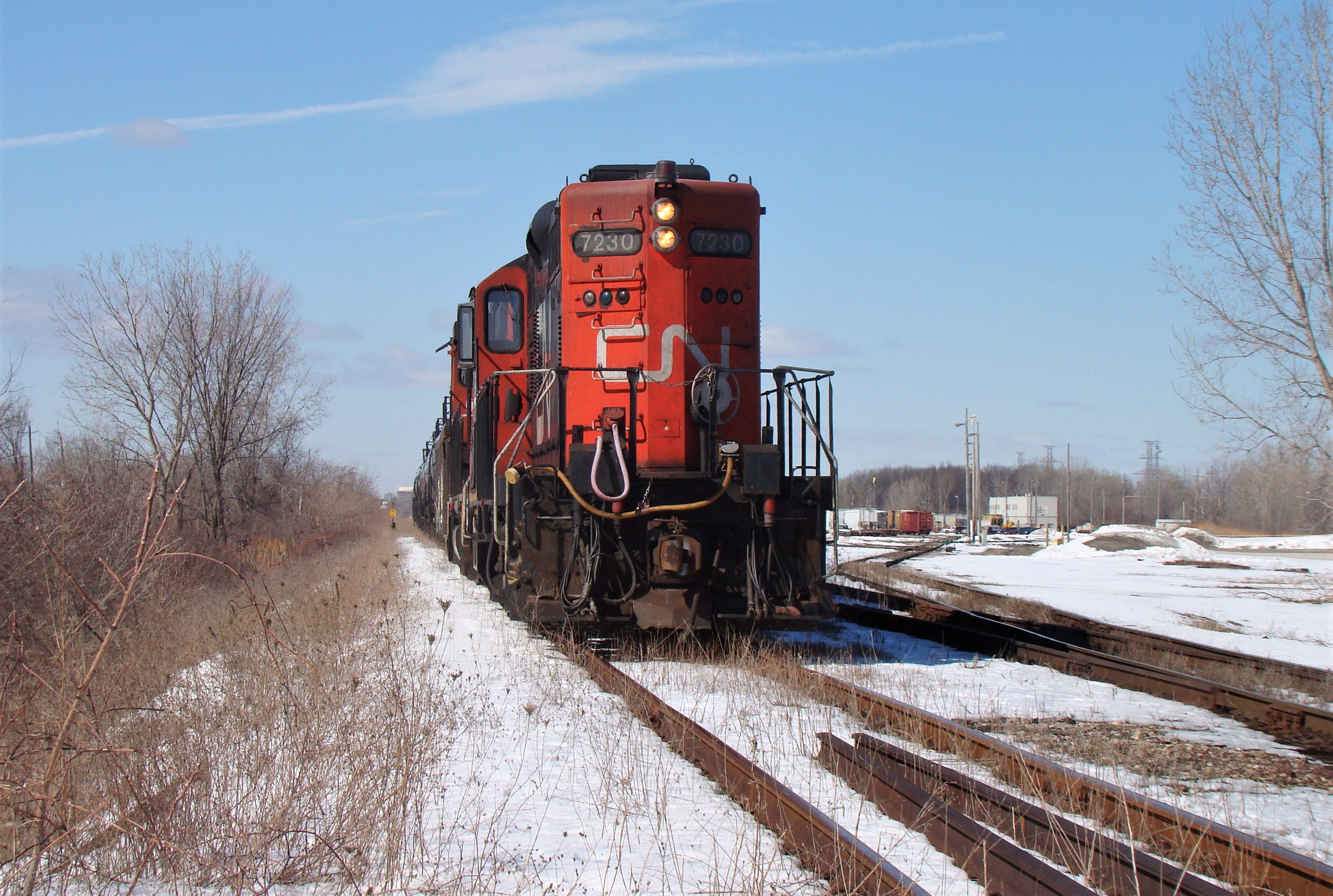 Railpictures.ca - Myles Roach Photo: CN 7280 and CN 4784 shove a cut of