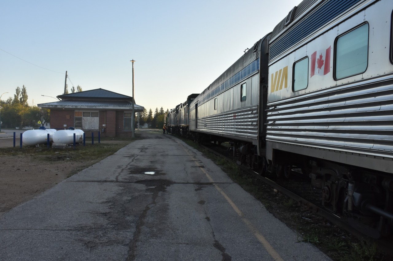 At the north end of the station platform in The Pas, MB we see the Keewatin Railway Company operations building which appears to be closed and completely boarded up (not sure of its status) as the headend crew of VIA #693 prepares to climb into the cab of VIA 6443 to continue the journey north to our destination of Churchill, MB. There is no waiting around for better lighting to get here. I know that any photos I take here are good photos because the next time I get to spend any amount of time in this remote community may be never!