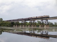 CP 41B crosses over the Trent River heading back out west, after spending a week and a half in Ottawa, for the CP Womens Golf League. Leading these beautiful Royal Cars are a pair of beautiful F units, and a B unit creating power for the F units to haul their train back west. 