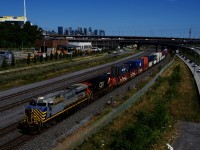 One of the newest additions to the CN roster leads CN 123 past the skyline of downtown Montreal. CN 2781 is ex-CREX 1341 and was acquired just a couple of months back.