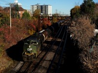 The D-Day tribute unit leads ethanol train CP 528 as it approaches North Jct with a nice multimarked buffer car up front. It took me almost two years to finally shoot CP 6644, the last CP military unit that I hadn't shot till today.