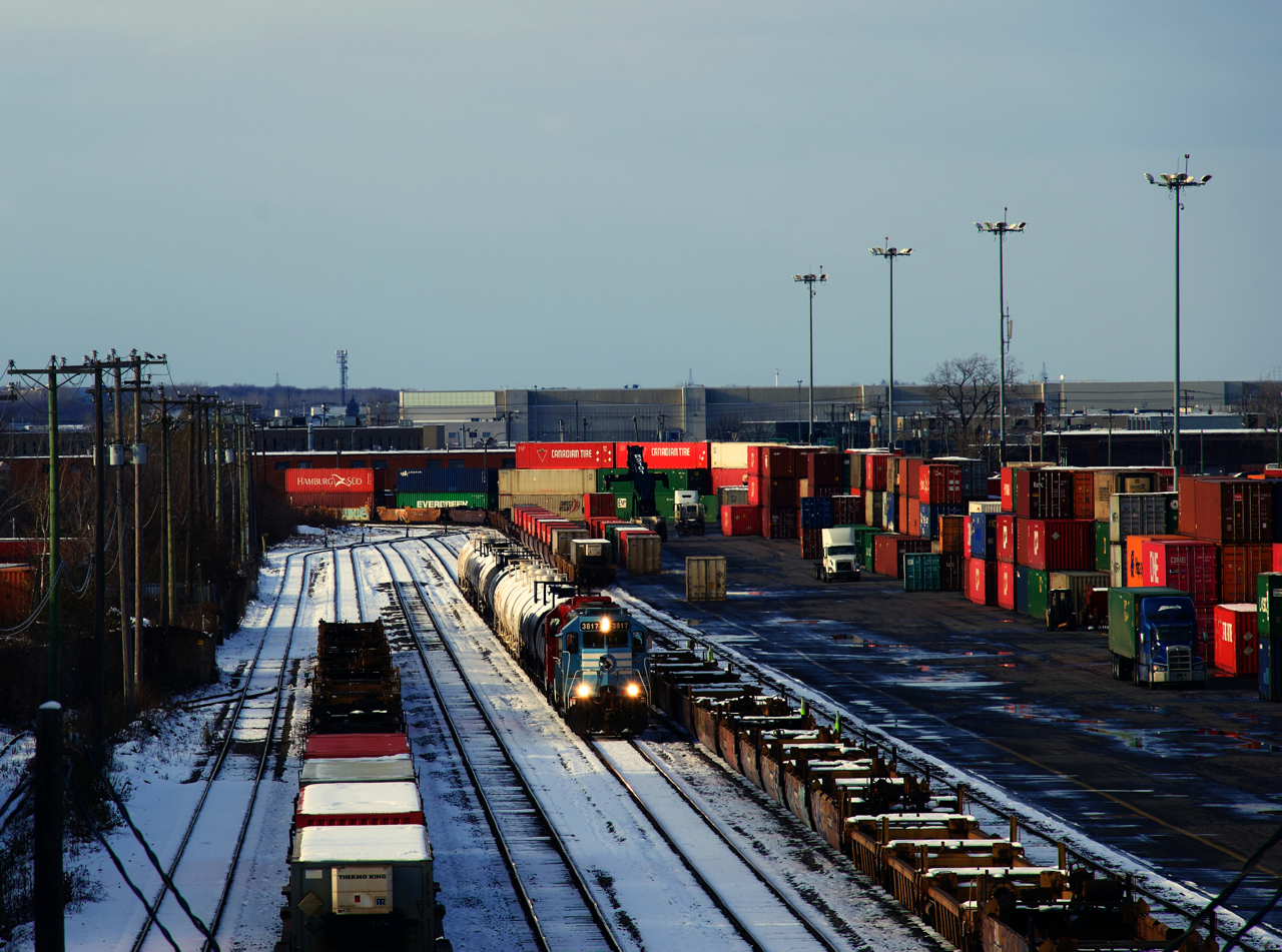 After switching out Coke, CP G95 is heading through Lachine IMS Yard to get back to St-Luc Yard. Normally they would go back to the main line going the other direction, but CP 112 was coming and would follow CP G95 into the yard.