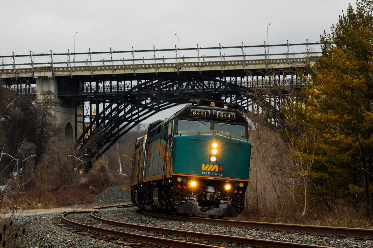 VIA 2 applies its breaks liberally as it gradually descends down the Don Valley to arrive at Toronto. Behind it is the Prince Edward Viaduct, built in 1918 to serve some impressive urban capabilities. The upper deck holds the busy Bloor Street East and a pair of bicycle lanes, whilst the lower deck serves as a vital and scenic connection for the TTC Line 2. I'm curious if I'll be able to find any oldies when there were once streetcars on the upper deck. In future, I may return to attempt getting a T1 in the shot...