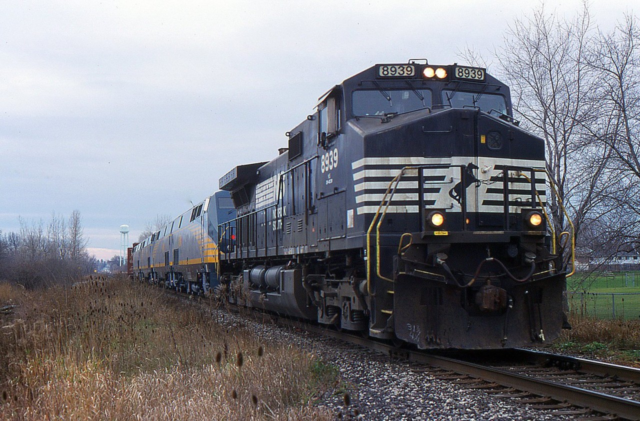 Image caption: NS 445 with NS C40-9W 8939 and four brand new VIA Rail P42DCs are being delivered from GE to VIA Rail to be put in service on regular VIA trains.