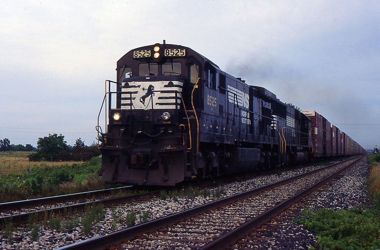 A late evening NS 327 through St. Catharines on the CN Grimsby Sub in 1996.