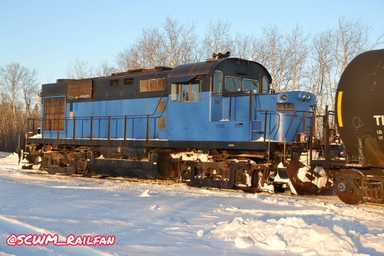 Lakeline 911, MLW RS18, idles at the Netley Grain elevator waiting for its next run.