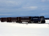 After extensive switching at Saint-Lambert-de-Lauzon (where most of the Sartigan's clients and cars are), the southbound Sartigan run is heading to the home base of Scott with three empties for Alexandre Côté Ltée.