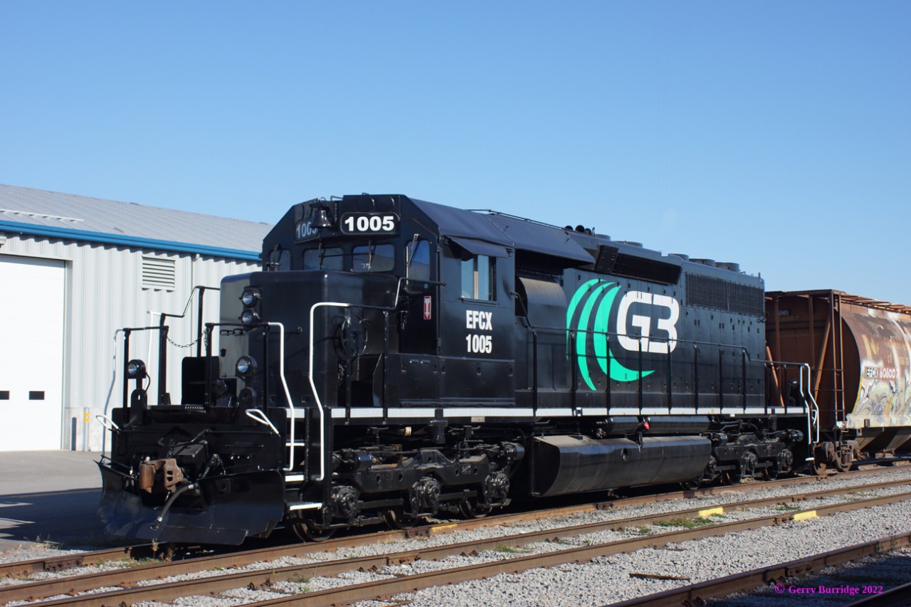 G3 Canada(EFCX) SD40-3 1005, in fresh paint at the Port of Quebec, Quebec, Que. 
Originally Canadian National GMD-built SD40 5094.  
G3 Canada[Global Grain Group] is a joint subsidiary of Bunge Canada and SALIC Canada, created in 2015 to acquire majority ownership of the Canadian Wheat Board upon its privatisation.