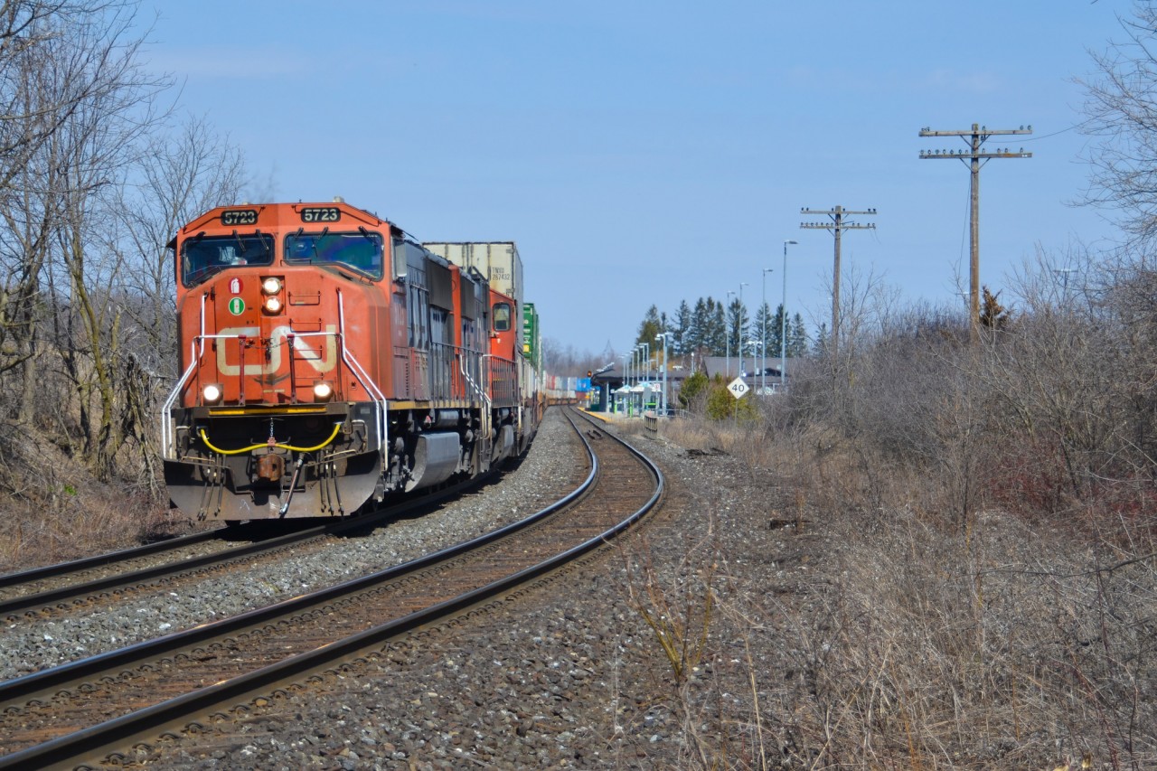 With the recent removal of most of the old telegraph poles on the CN Bala mainline from Toronto to Washago, the S curve looking north through Gormley provides a refreshing reminder of the railway's past. With dynamic brakes whining, a venerable duo of EMD SD70/75 series diesels roll Q108 south towards Doncaster.